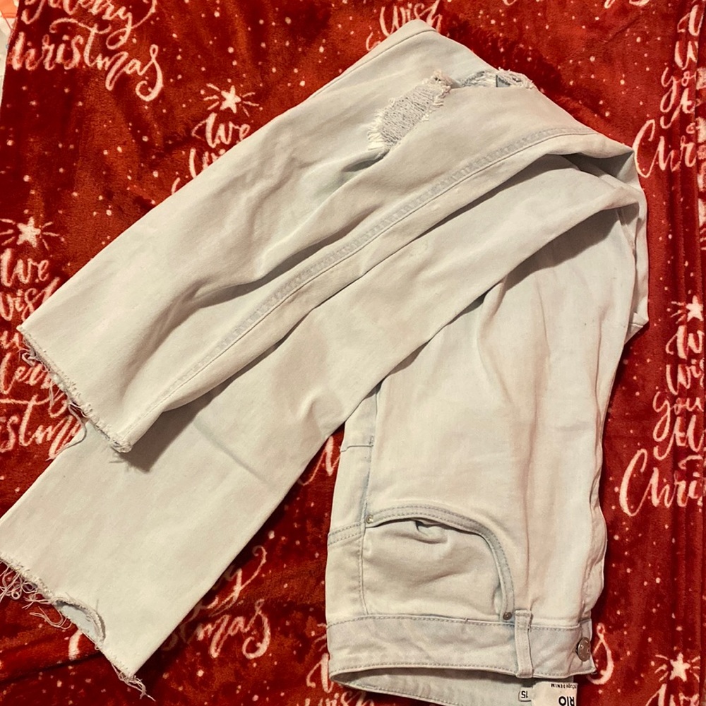 Size 15 light wash ripped jeans. Worn once just asking for $10!!